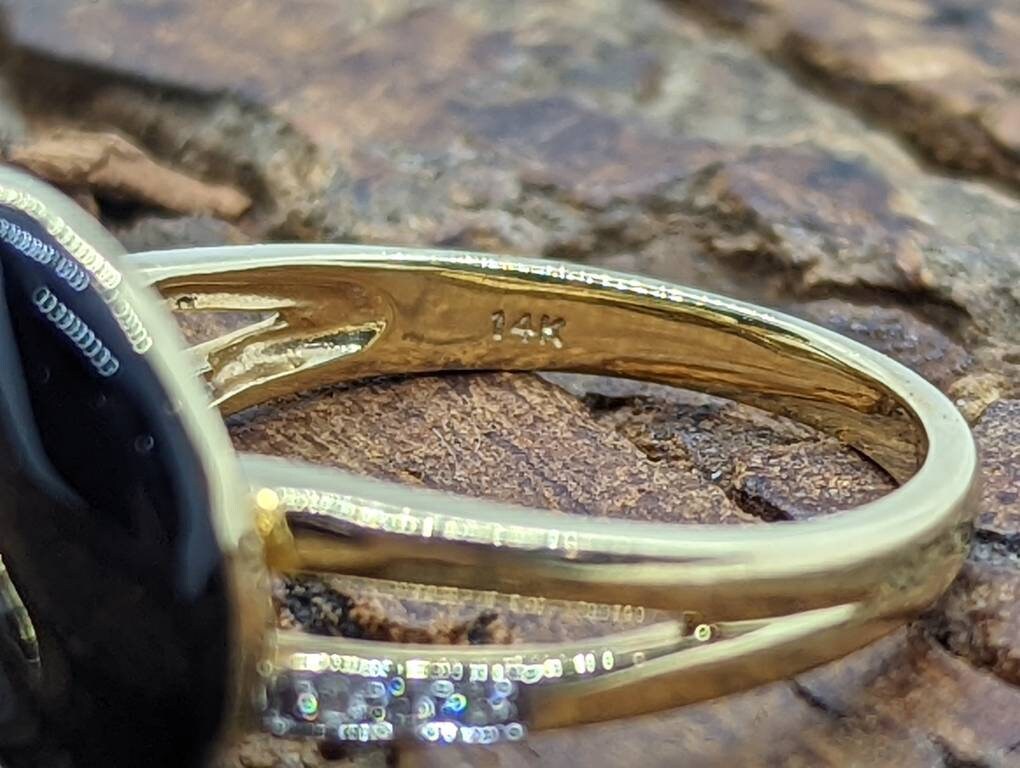 14k Onyx and diamond Band. 14k Curved Oval Disk Onyx and channel set diamond ring. Abstract Onyx ring. st (138/00)