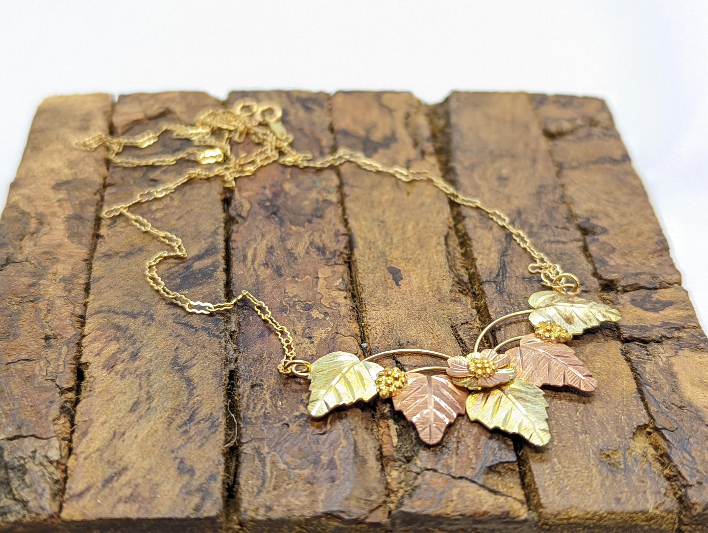 Black Hills Gold Necklace. Heavy Vintage 10k Pendant and Necklace made by Black Hills Gold. stock 54/63