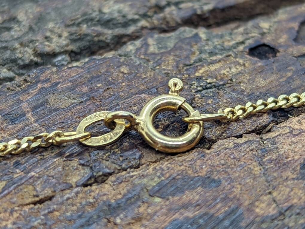 14k Butterfly Necklace. Multiple Butterfly pendants on a necklace. Yellow gold curb chain. st77/60