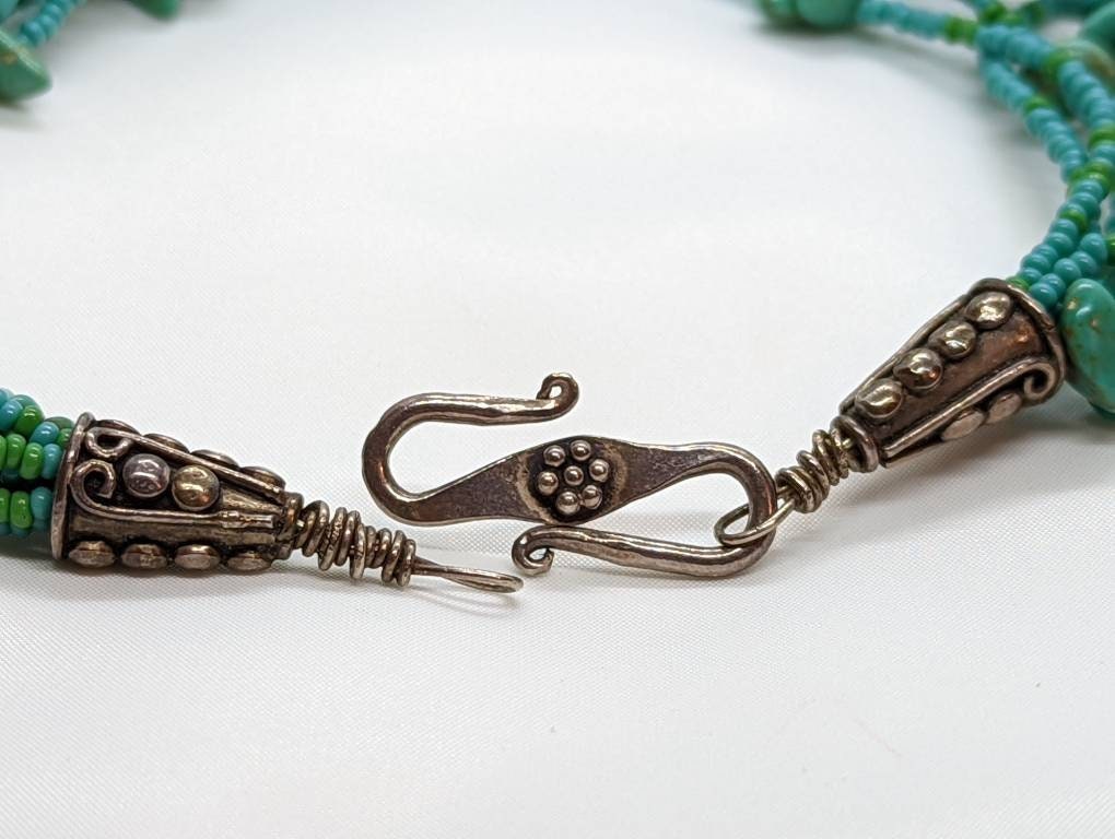 Polished Turquoise Necklace. Multi-strand Liquid polished turquoise Bulky bead necklace.Sterling Silver (st8/15)