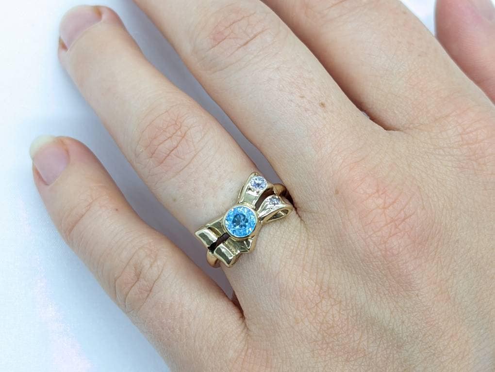 Antique LONDON Blue topaz and Diamond ring. Bezel Topaz and Diamond Bow Knot Love ring. st(88/33)