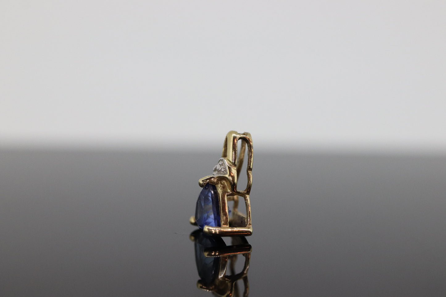 10k Tanzanite and diamond Pendant. Trillion cut Tanzanite Solitaire Pendant. st(20)