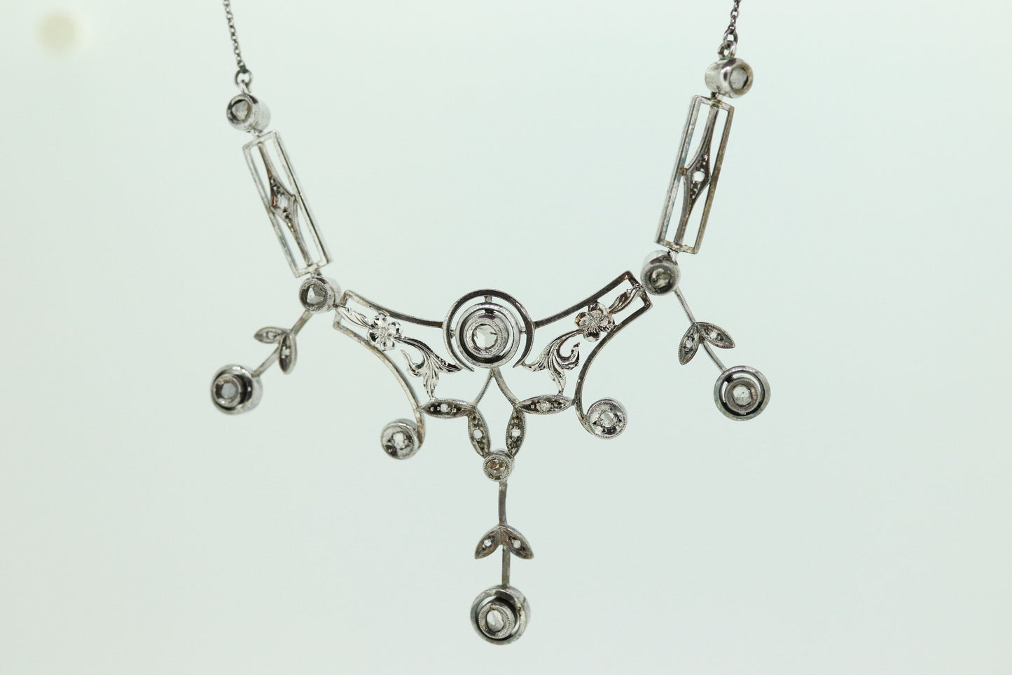 Antique Diamond lavaliere. Sterling Silver with a rough cut diamond bezel set. Art nouveau era st170