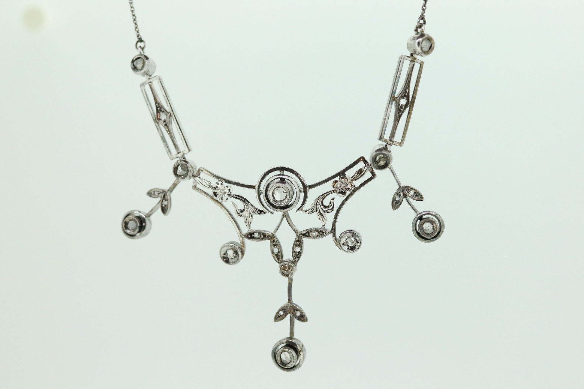 Antique Diamond lavaliere. Sterling Silver with a rough cut diamond bezel set. Art nouveau era st170