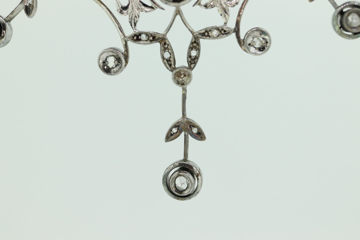 Antique Diamond lavaliere. Sterling Silver with a rough cut diamond bezel set. Art nouveau era st170