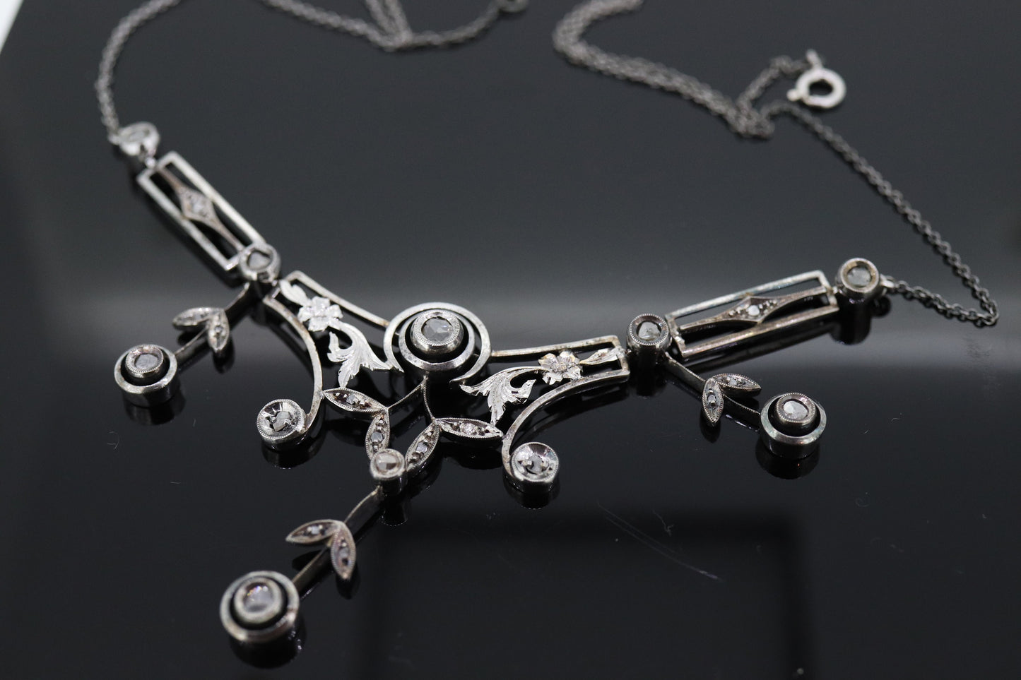 Antique Diamond lavaliere. Sterling Silver with a rough cut diamond bezel set. Art nouveau era st170