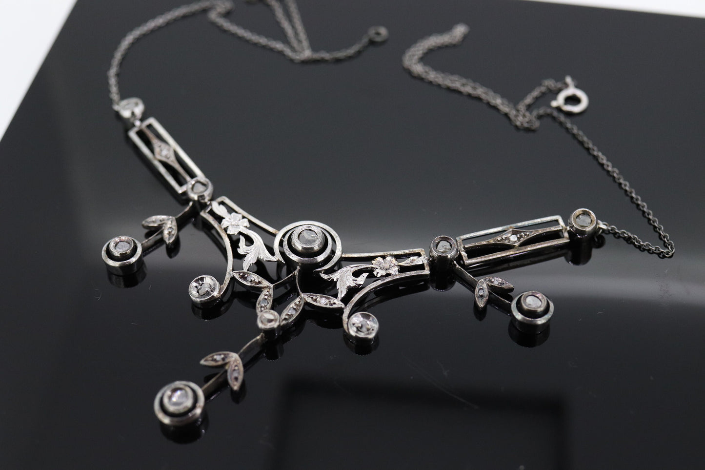 Antique Diamond lavaliere. Sterling Silver with a rough cut diamond bezel set. Art nouveau era st170