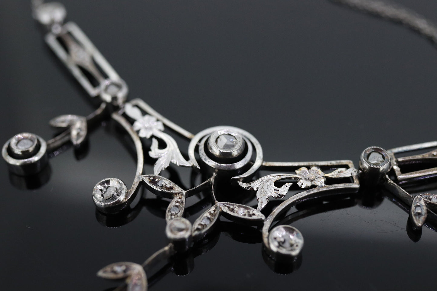 Antique Diamond lavaliere. Sterling Silver with a rough cut diamond bezel set. Art nouveau era st170