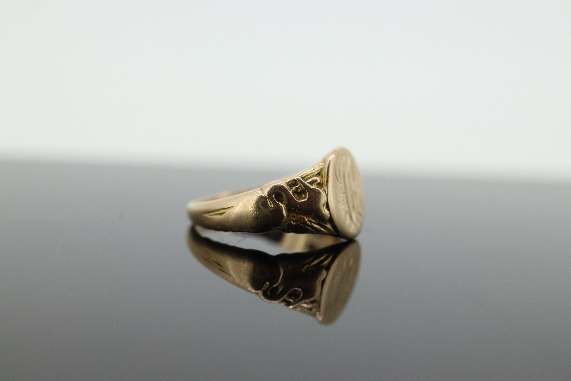 Signet Ring. 10k Yellow gold with STORK Bird Embossed shoulders. engraved HK can be engraved. st(37)