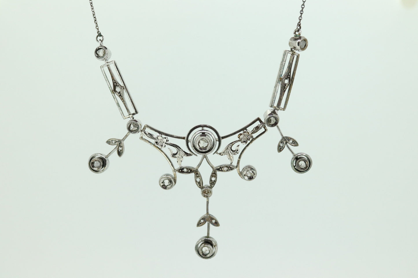 Antique Diamond lavaliere. Sterling Silver with a rough cut diamond bezel set. Art nouveau era st170