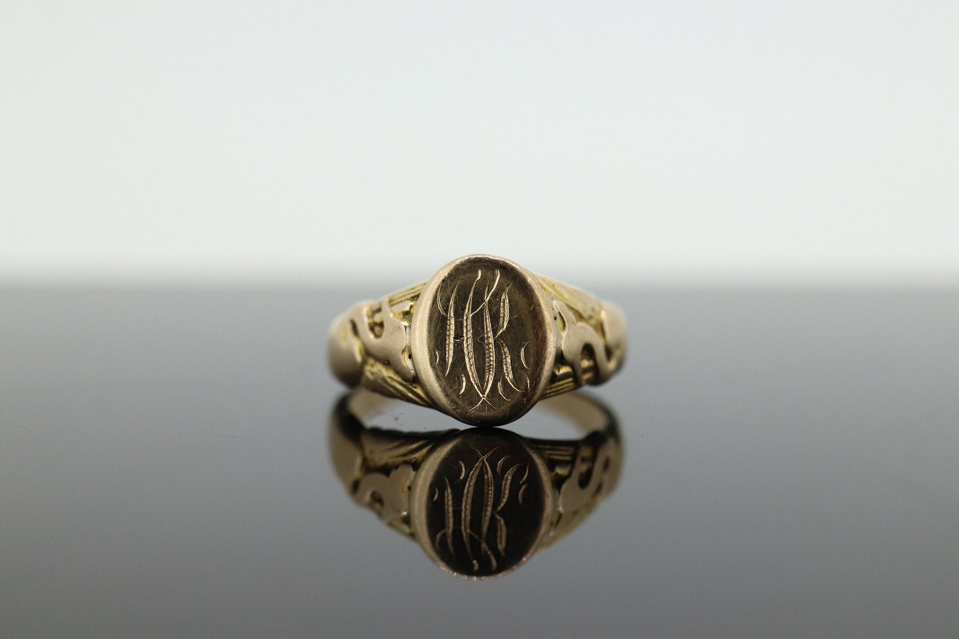 Signet Ring. 10k Yellow gold with STORK Bird Embossed shoulders. engraved HK can be engraved. st(37)