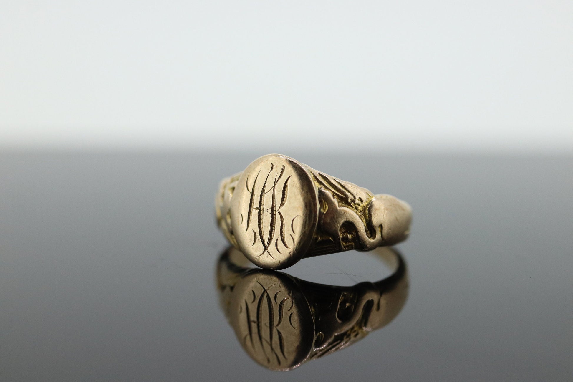Signet Ring. 10k Yellow gold with STORK Bird Embossed shoulders. engraved HK can be engraved. st(37)