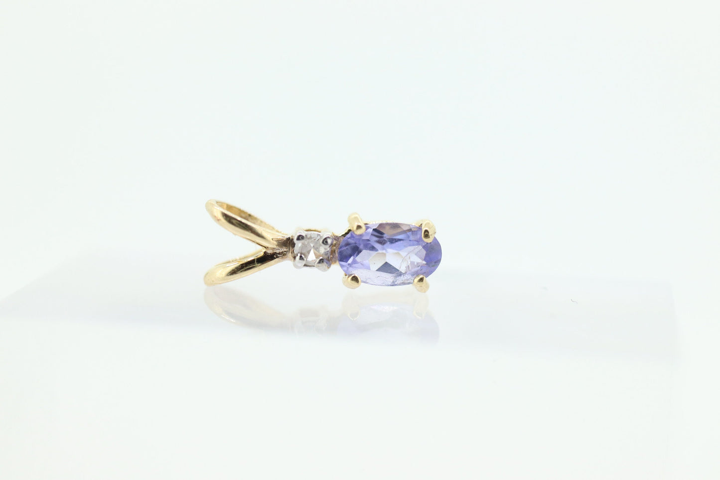 14k Tanzanite and diamond Pendant. Dainty Oval cut Tanzanite Solitaire Pendant. st(50)