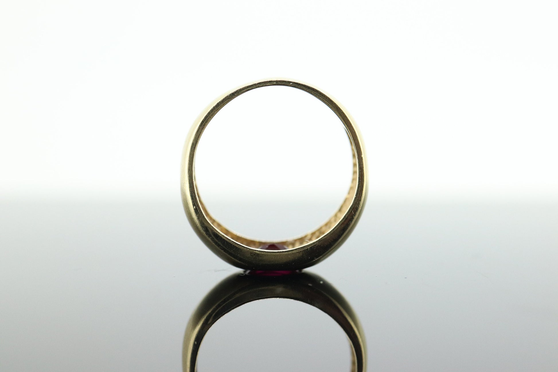 14k Ruby Ring. Bezel set Ruby ring. 14k yellow gold and oval Ruby bezel set. Wide ruby band. st(106)