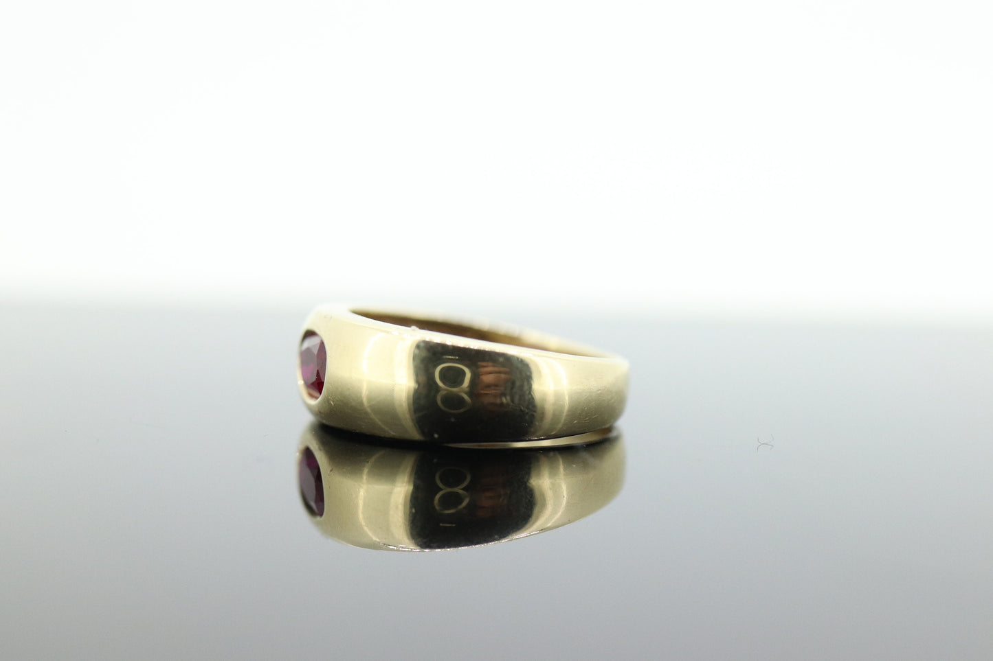 14k Ruby Ring. Bezel set Ruby ring. 14k yellow gold and oval Ruby bezel set. Wide ruby band. st(106)