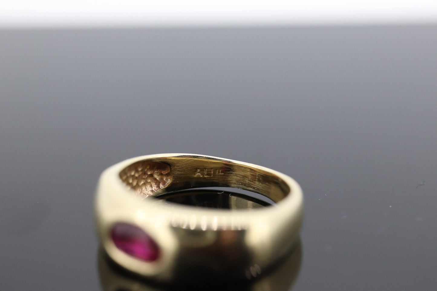 14k Ruby Ring. Bezel set Ruby ring. 14k yellow gold and oval Ruby bezel set. Wide ruby band. st(106)