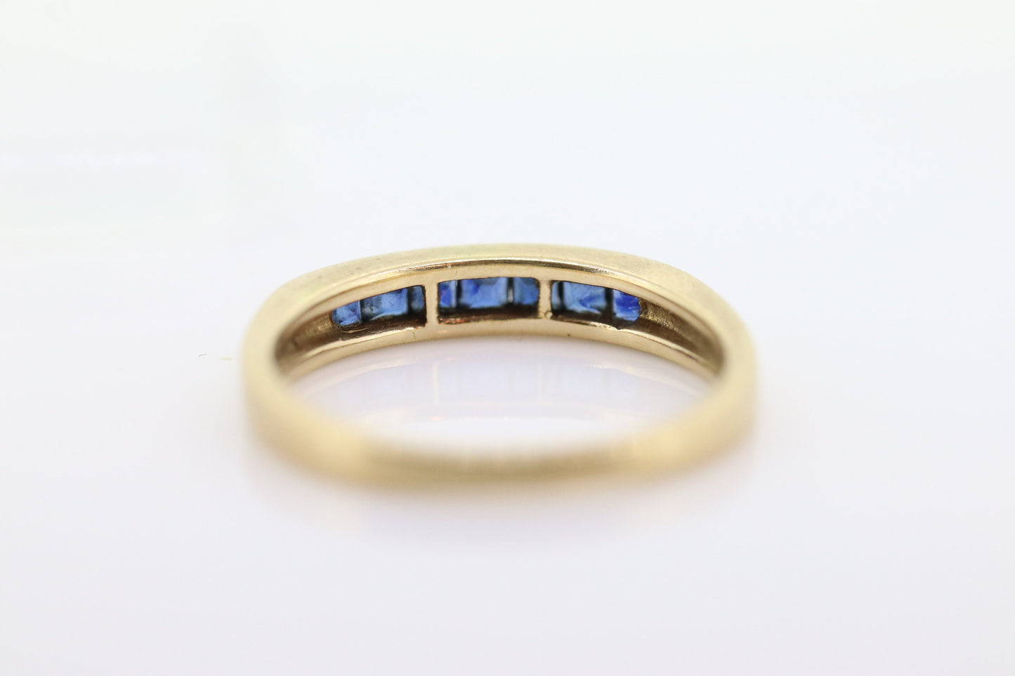 14k Gold BLUE Sapphire Eternity Band. Channel Set Princess Sapphire calibre cut Half Eternity band. st(98)