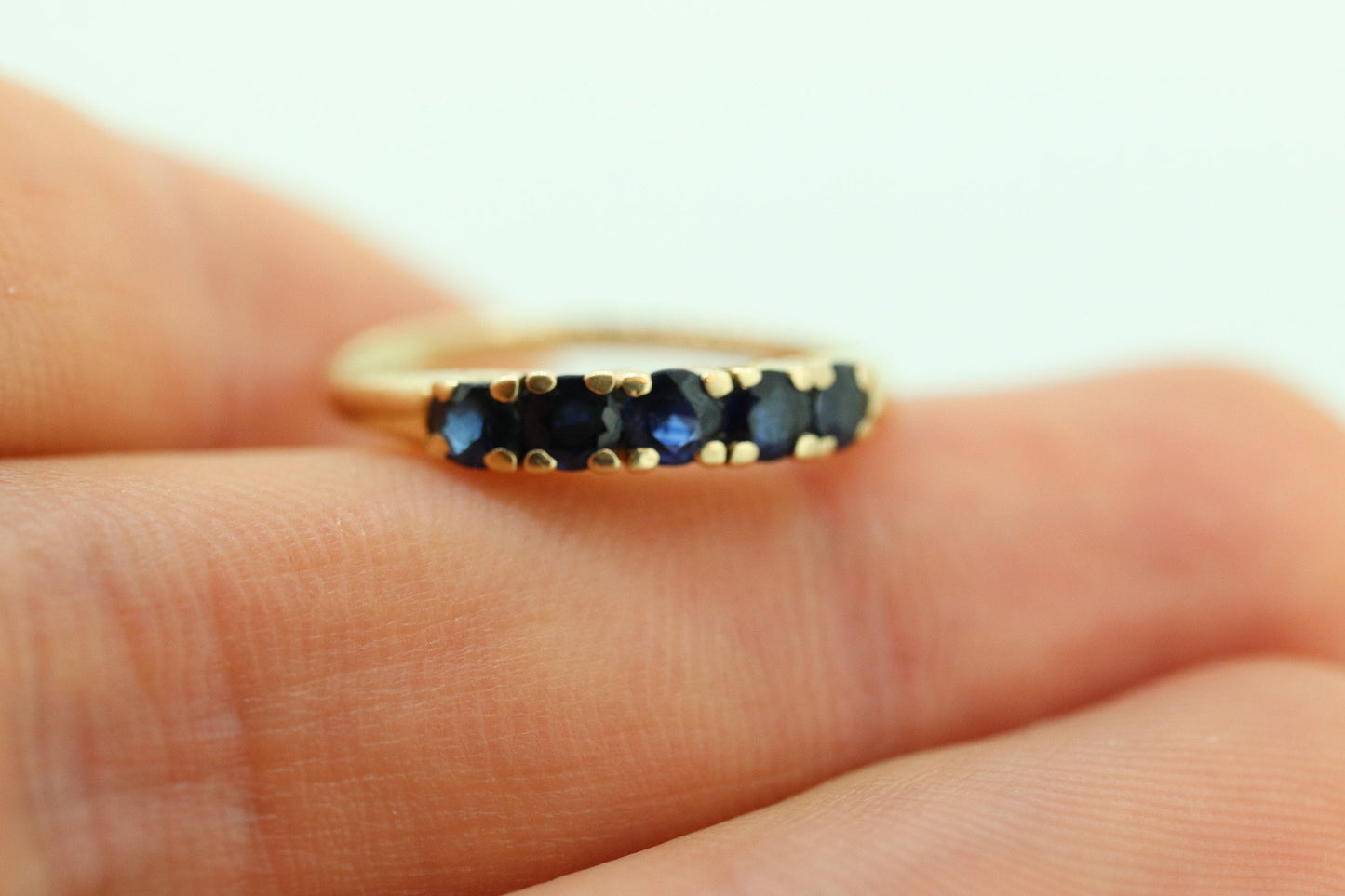 14k Gold BLUE Sapphire Eternity Band. Prong Set round Sapphire Half Eternity band. st(70)
