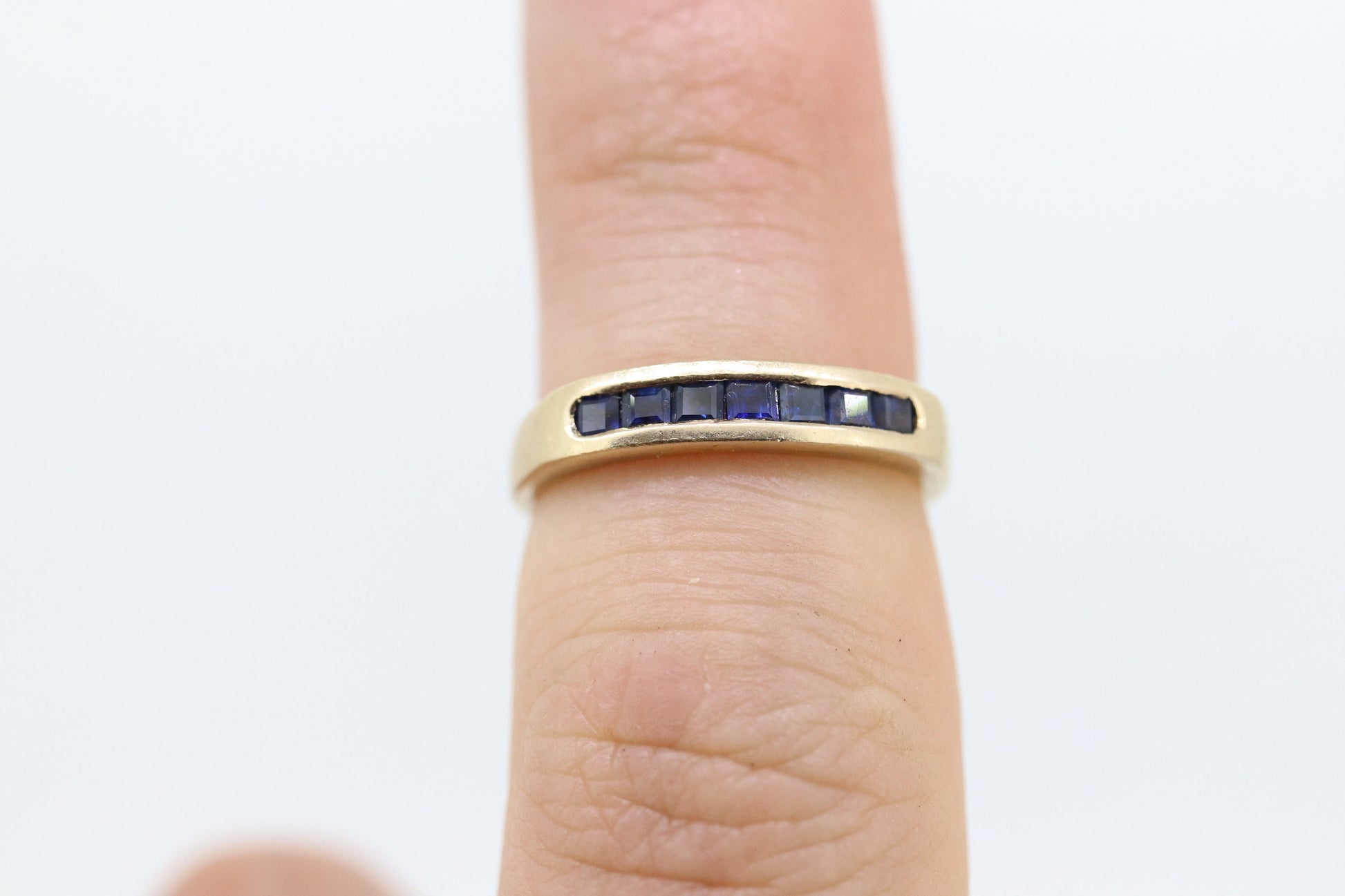 14k Gold BLUE Sapphire Eternity Band. Channel Set Princess Sapphire calibre cut Half Eternity band. st(98)