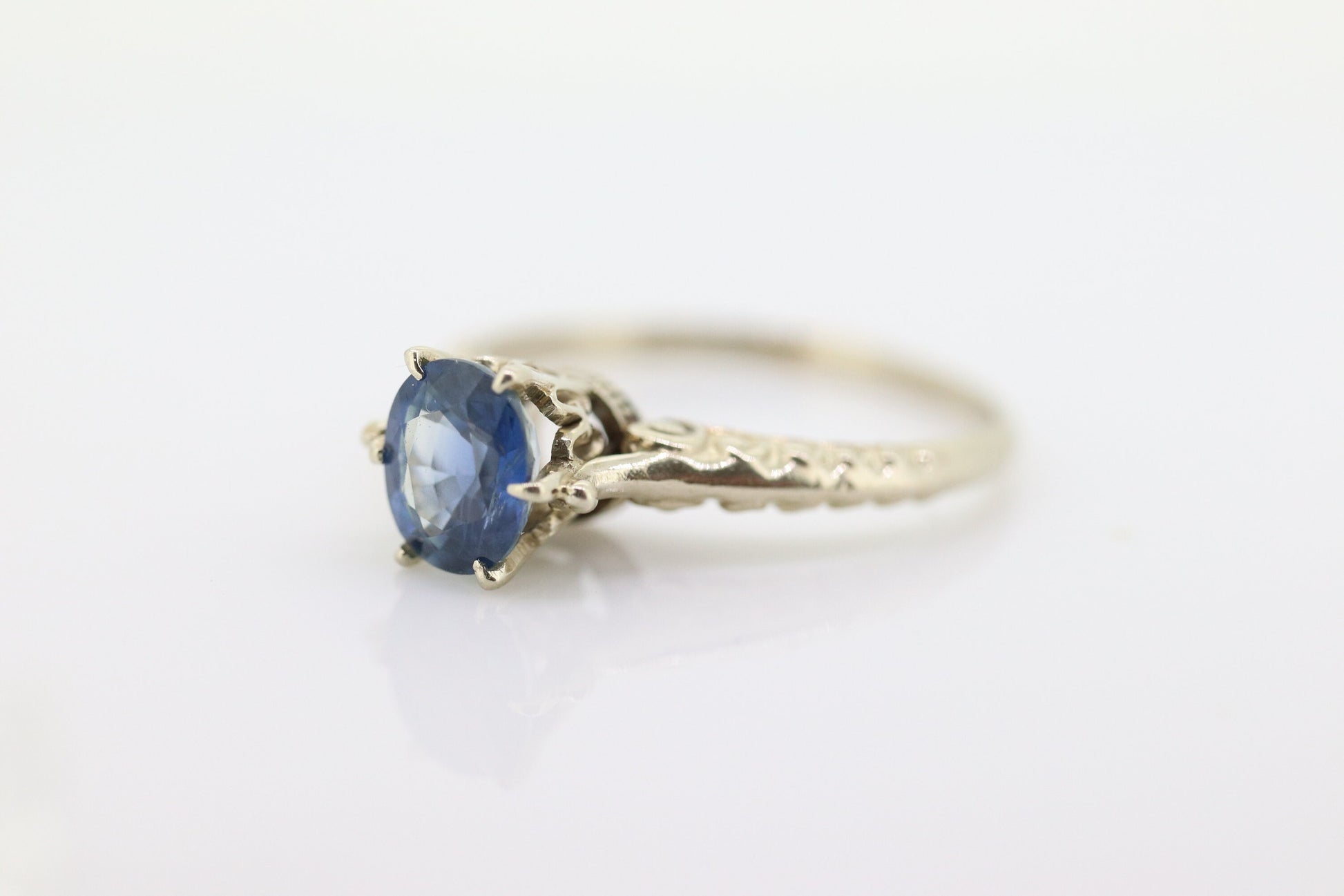 Large oval Sapphire 14k solitaire ring. 14k white gold Art deco engraved designs and high cathedral. st(63)