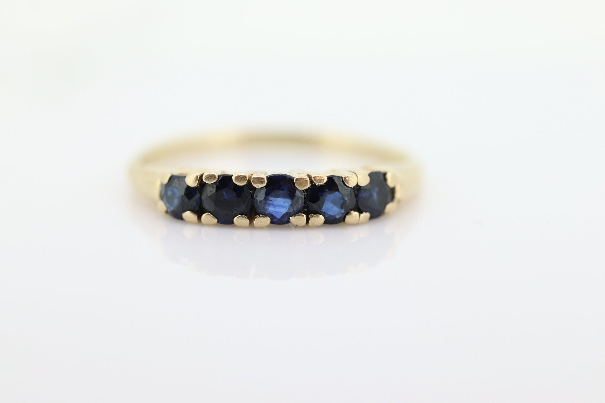 14k Gold BLUE Sapphire Eternity Band. Prong Set round Sapphire Half Eternity band. st(70)