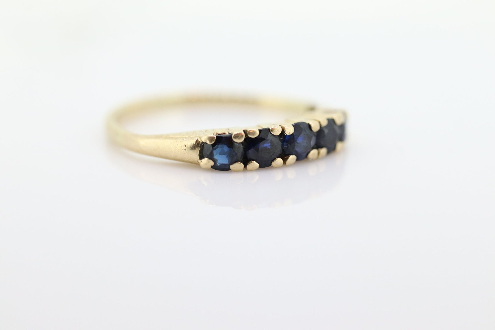 14k Gold BLUE Sapphire Eternity Band. Prong Set round Sapphire Half Eternity band. st(70)
