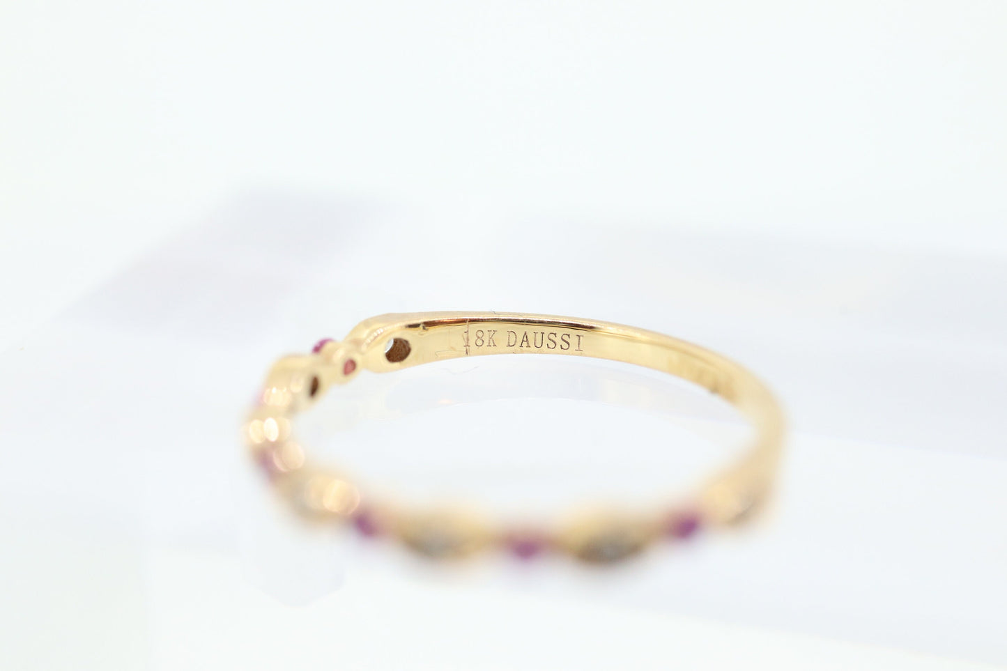 DAUSSI 18k Anniversary Ruby Diamond Ring. Henri Daussi 18k gold ring with round Ruby and diamond accents eternity band. st(253)