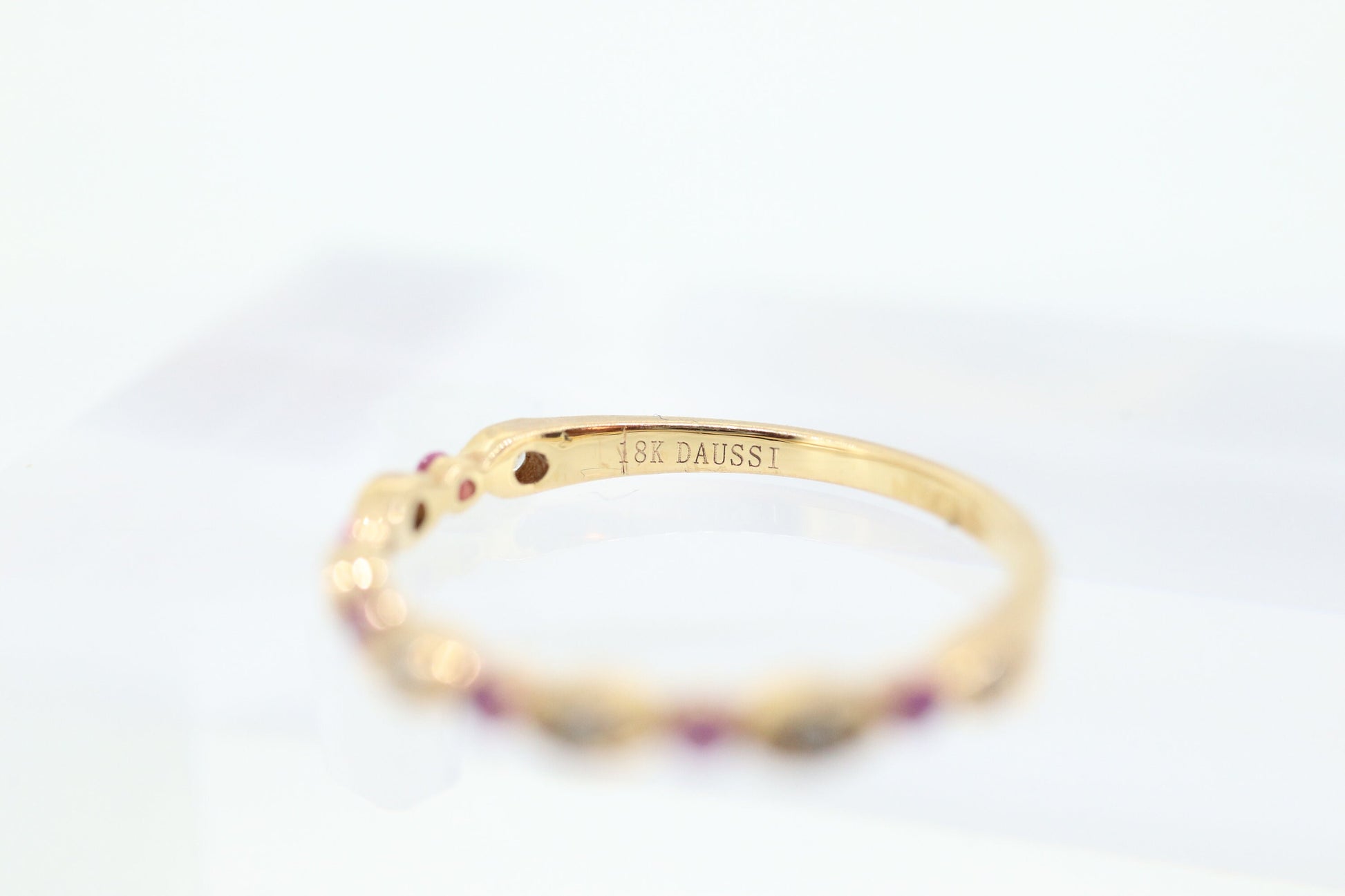 DAUSSI 18k Anniversary Ruby Diamond Ring. Henri Daussi 18k gold ring with round Ruby and diamond accents eternity band. st(253)