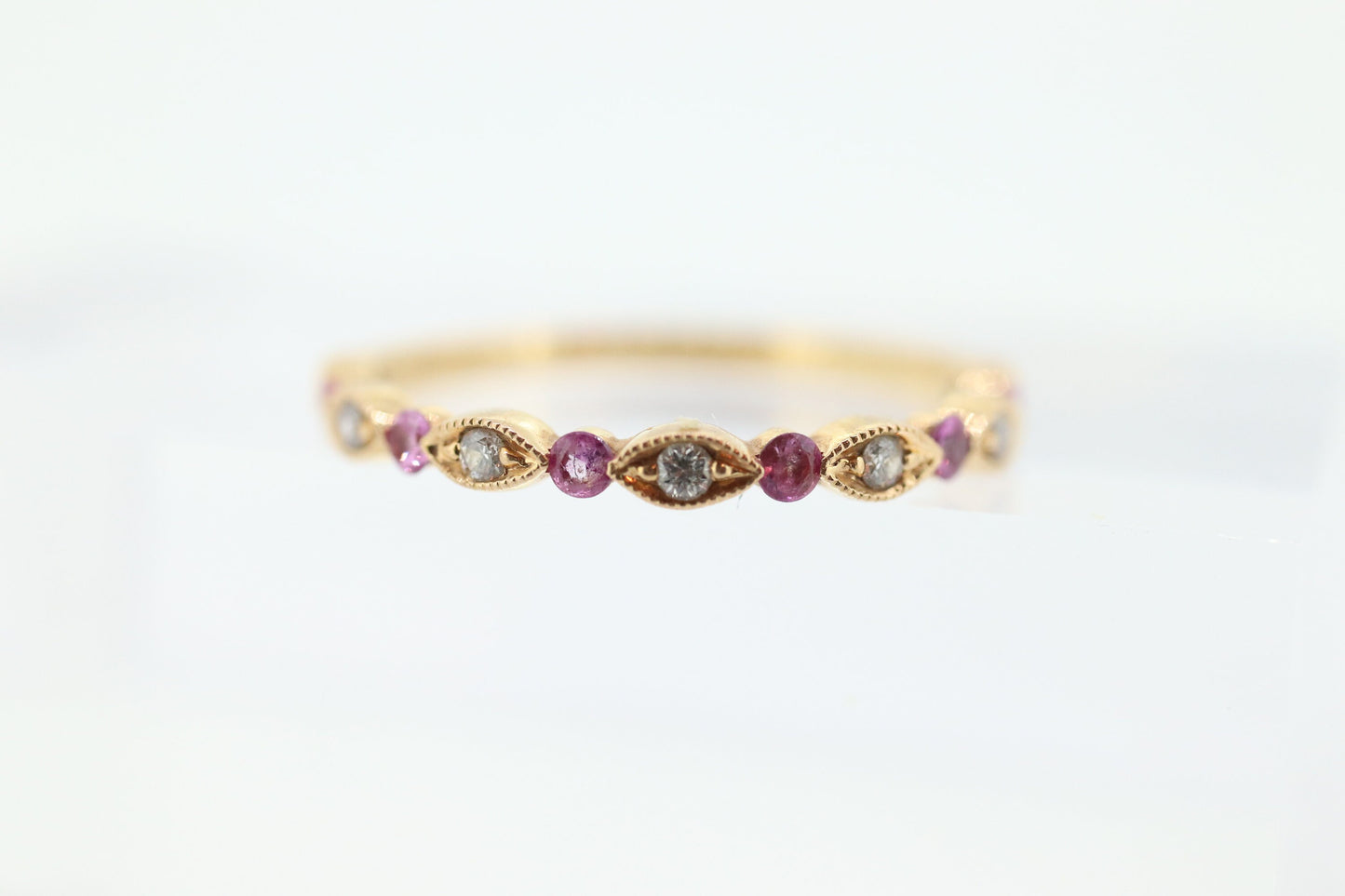 DAUSSI 18k Anniversary Ruby Diamond Ring. Henri Daussi 18k gold ring with round Ruby and diamond accents eternity band. st(253)