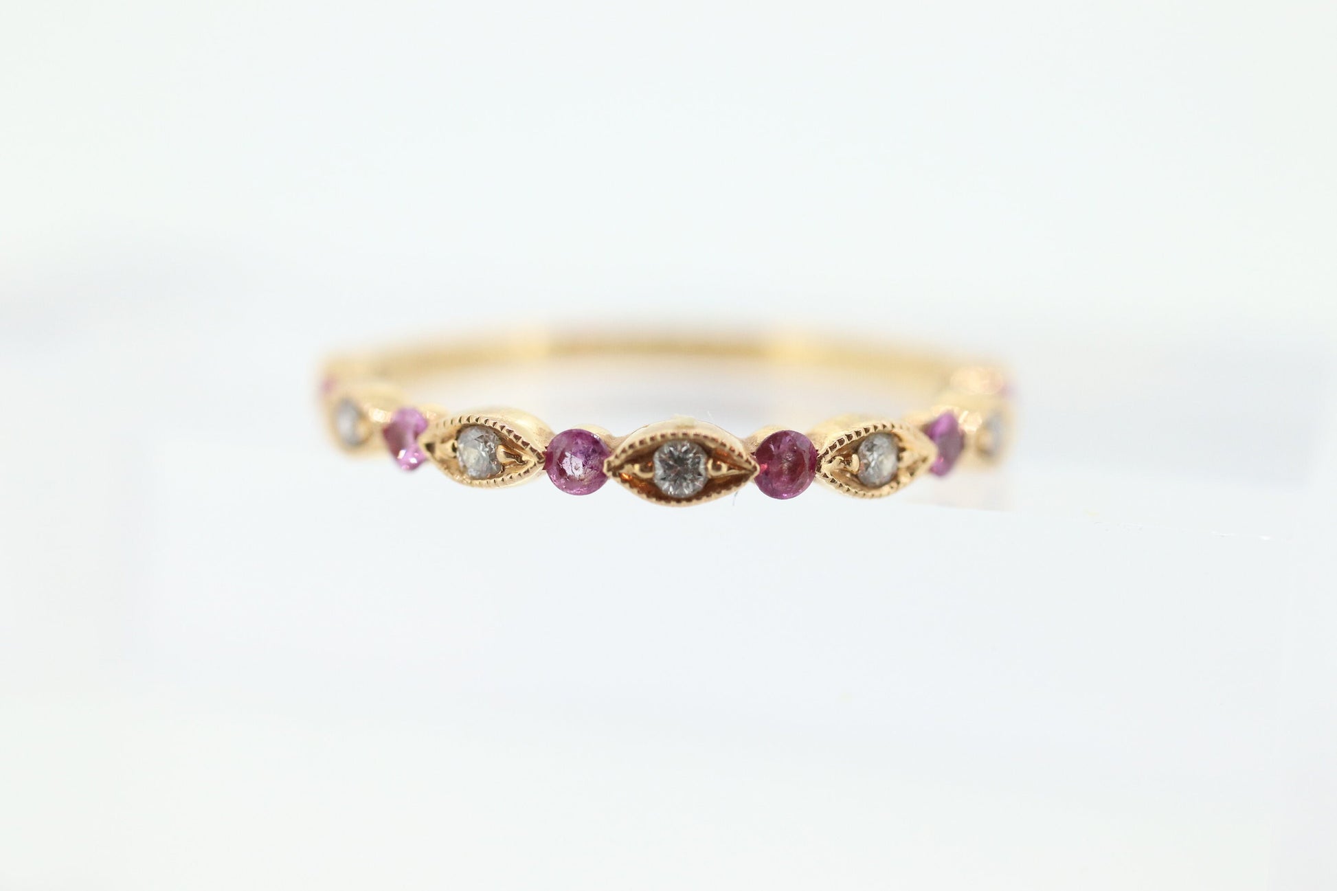 DAUSSI 18k Anniversary Ruby Diamond Ring. Henri Daussi 18k gold ring with round Ruby and diamond accents eternity band. st(253)