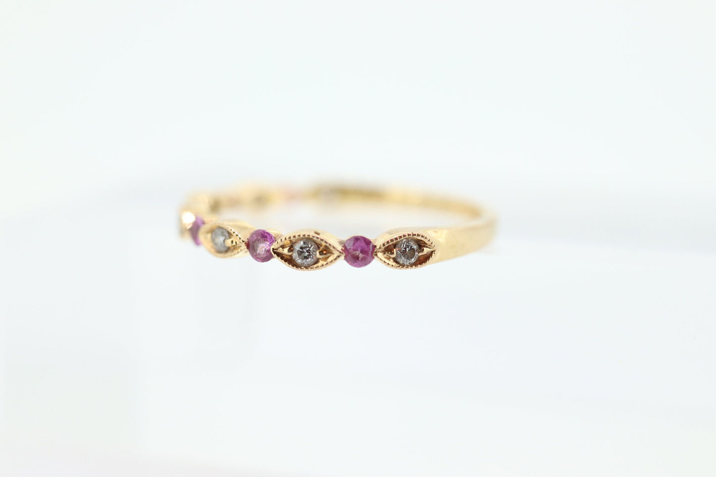 DAUSSI 18k Anniversary Ruby Diamond Ring. Henri Daussi 18k gold ring with round Ruby and diamond accents eternity band. st(253)
