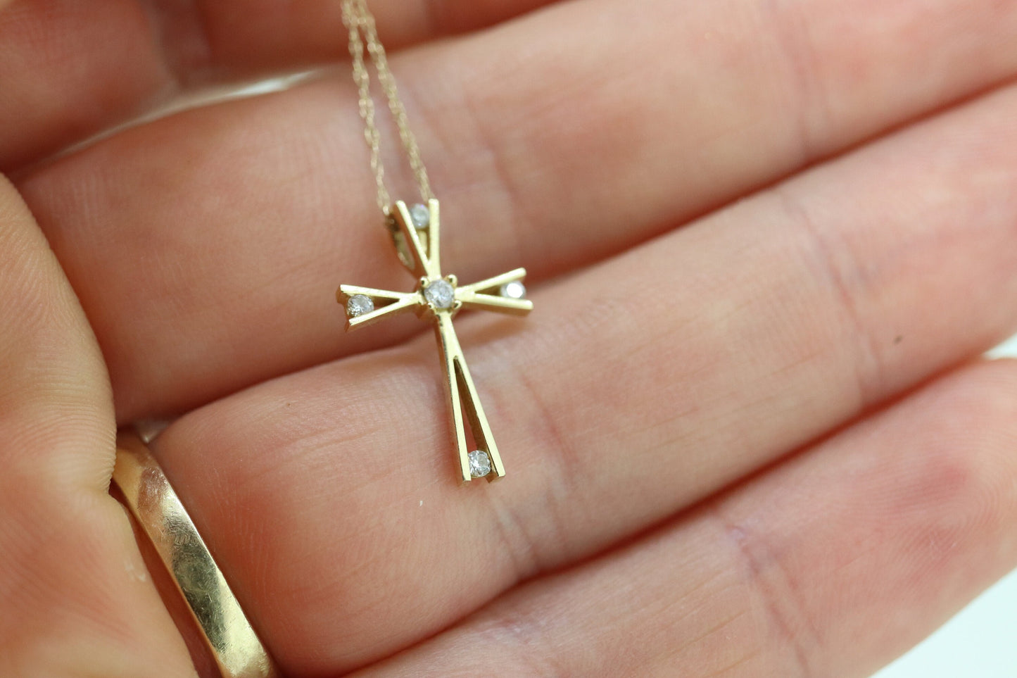 10k cross with diamonds pendant and rope chain necklace. Diamond tension Cross. 10k Yellow Gold.
