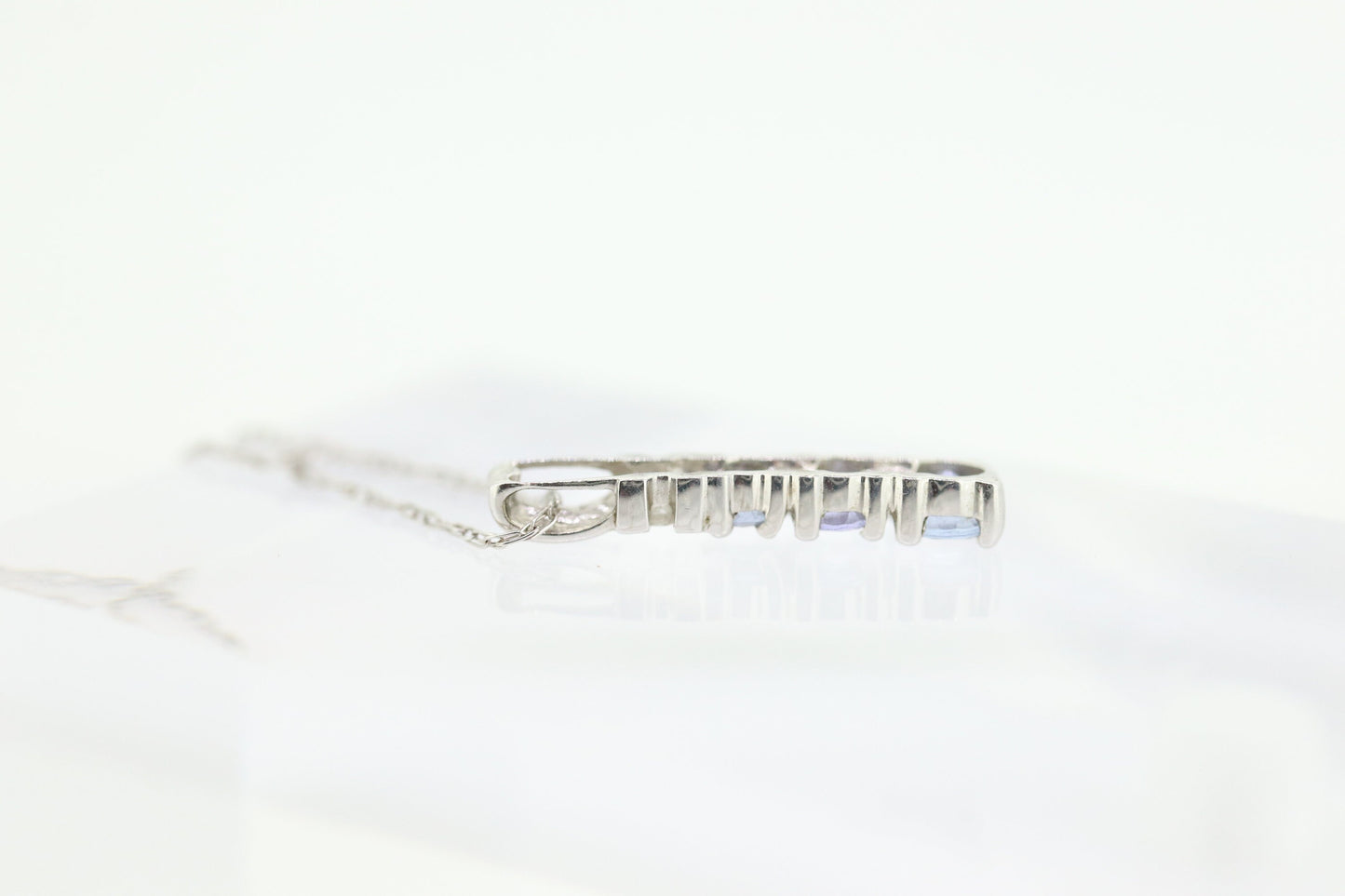 10k Tanzanite and diamond Journey Pendant. Past present future necklace