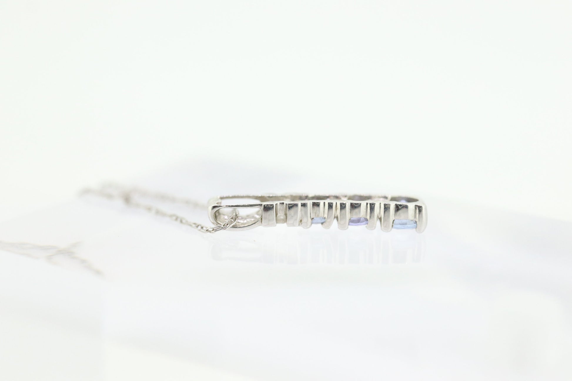 10k Tanzanite and diamond Journey Pendant. Past present future necklace