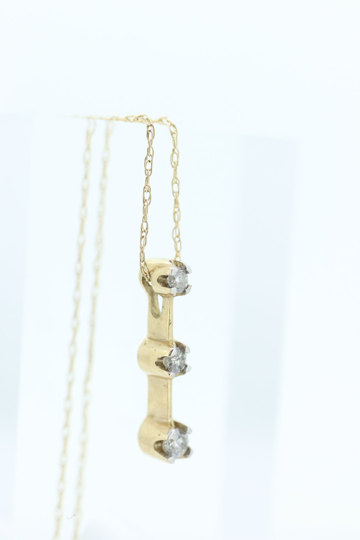 10k Diamond Pendant and Necklace. Three diamond pendant. Journey Past Present Future