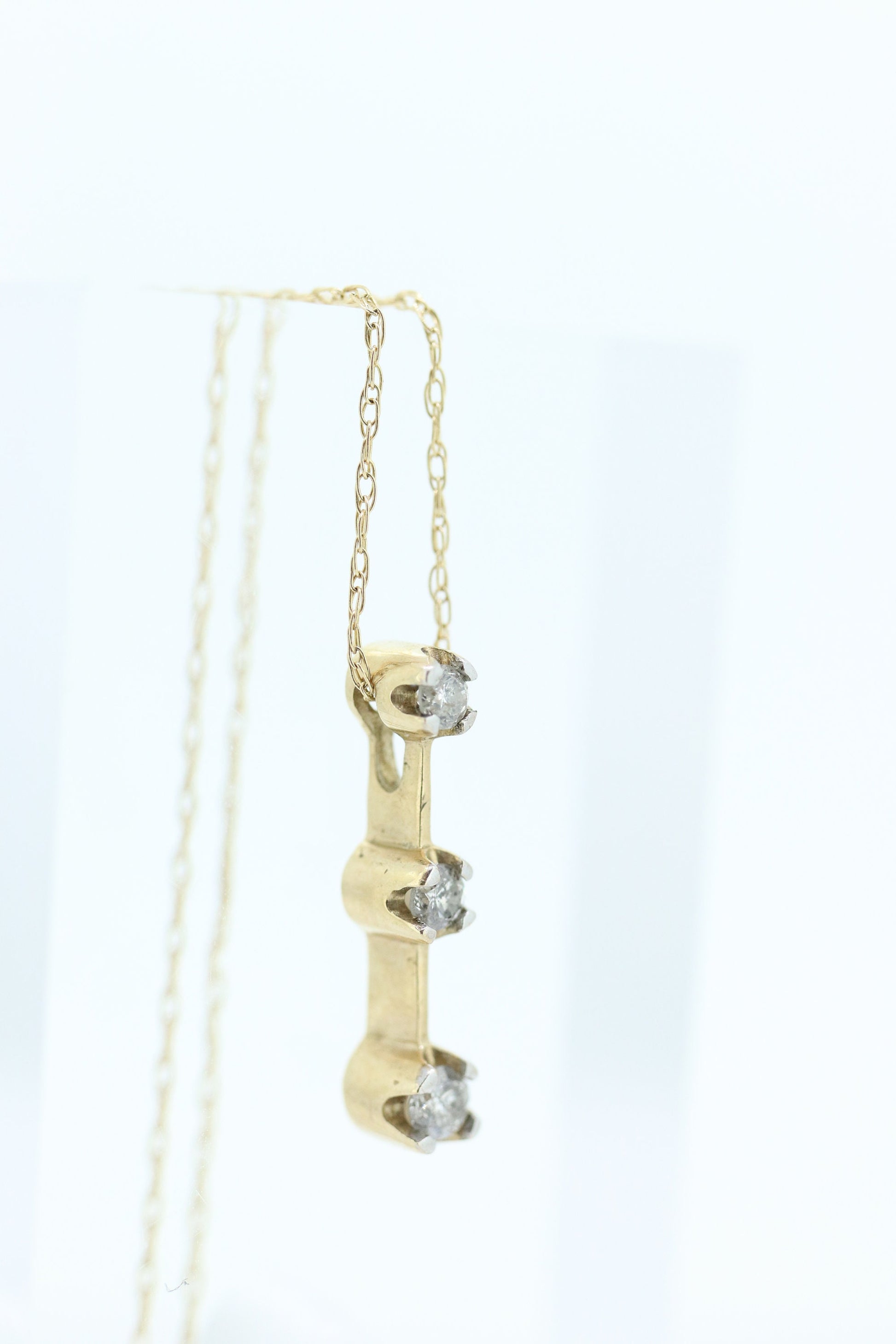 10k Diamond Pendant and Necklace. Three diamond pendant. Journey Past Present Future