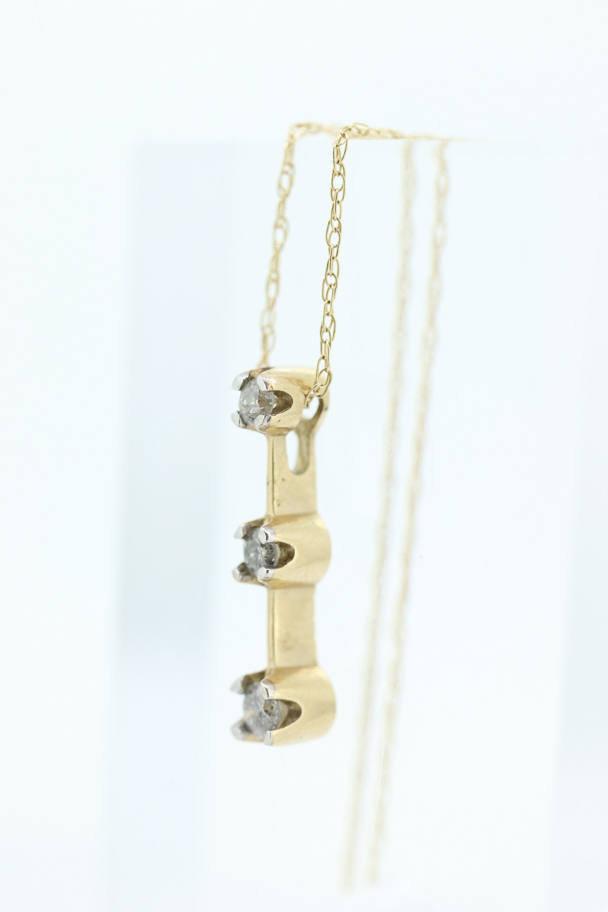 10k Diamond Pendant and Necklace. Three diamond pendant. Journey Past Present Future