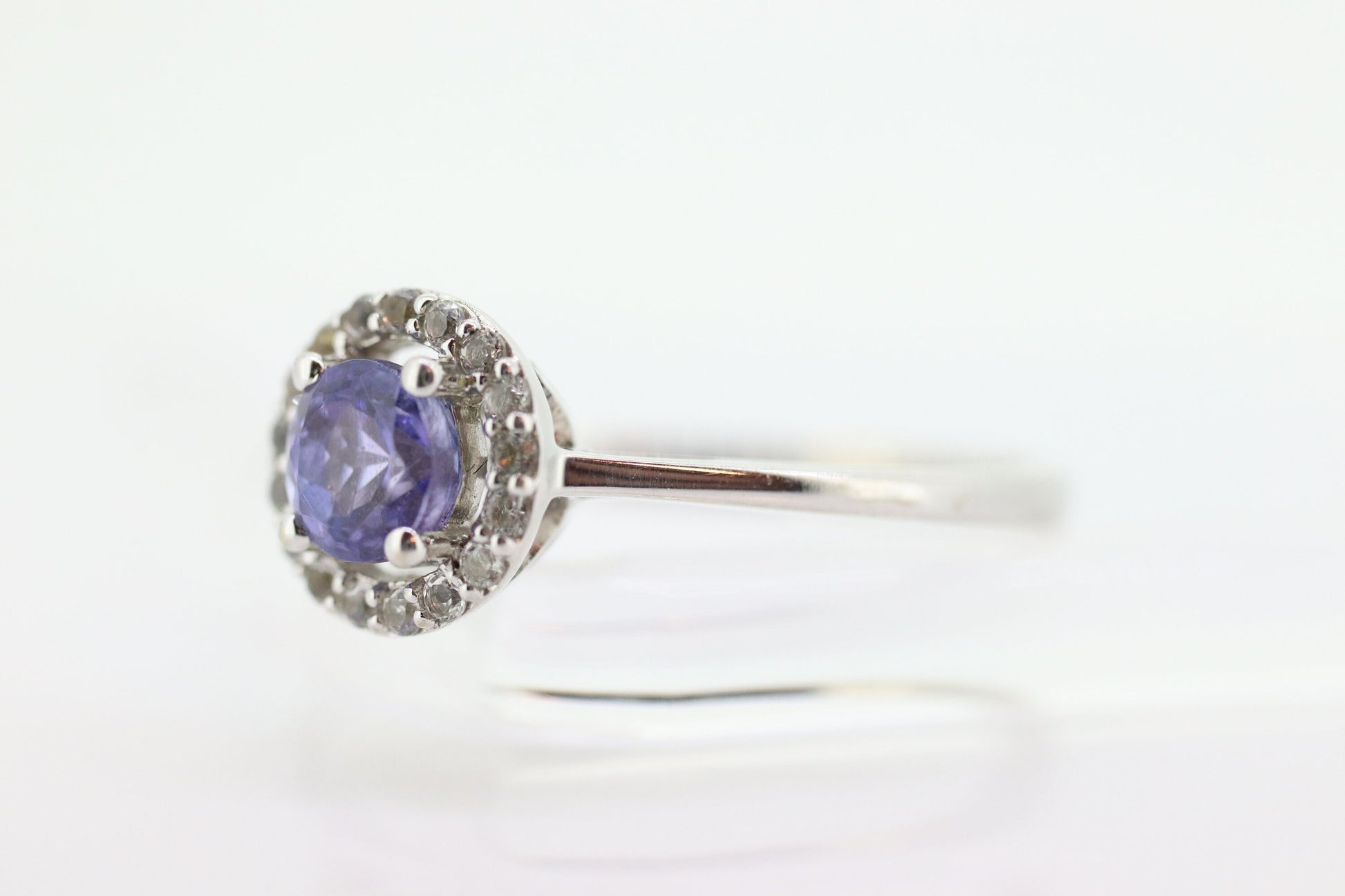 Tanzanite and White topaz (diamond) halo ring. 10k Purple Tanzanite solitaire. st(240)