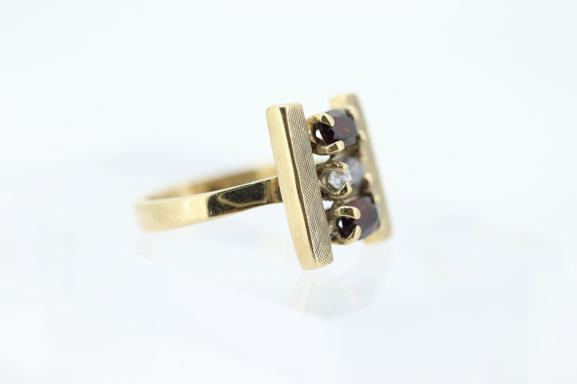 10k Marquise Garnet and Quartz ring. 10k Marquise cut garnet with Quartz Textured BAR ring. st(104)