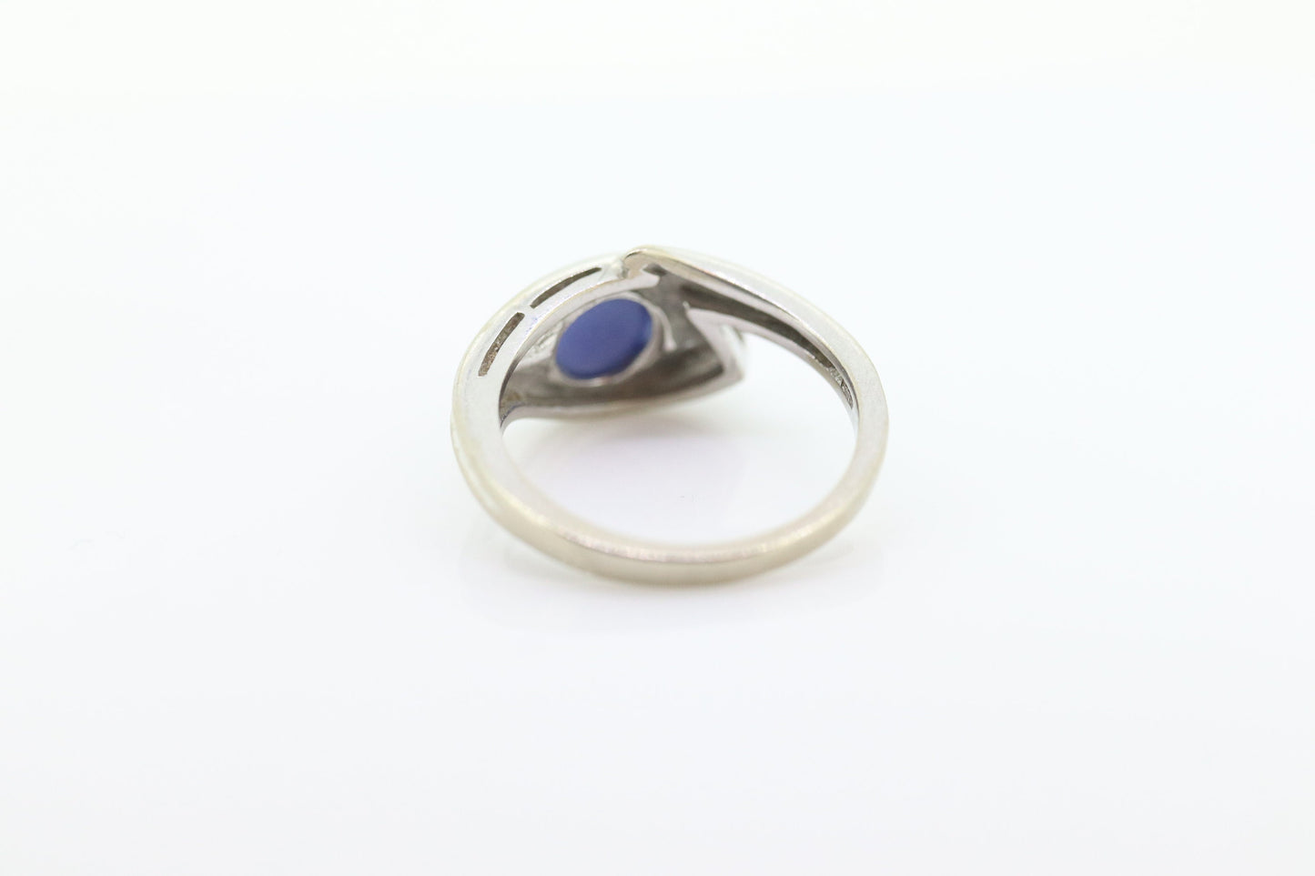 Linde Blue STAR Sapphire Solitaire ring. 10k White gold sapphire solitaire. Blue Star Sapphire bypass ring. st(97/75