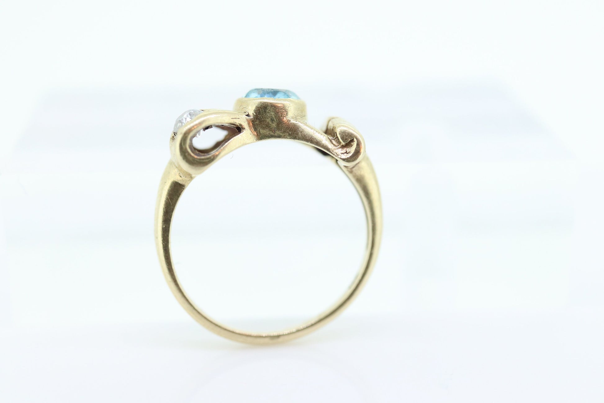 Antique LONDON Blue topaz and Diamond ring. Bezel Topaz and Diamond Bow Knot Love ring. st(88/33)