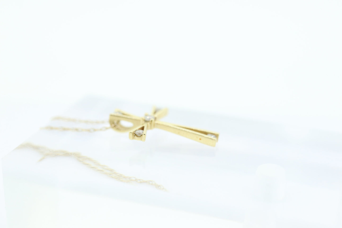 10k cross with diamonds pendant and rope chain necklace. Diamond tension Cross. 10k Yellow Gold.
