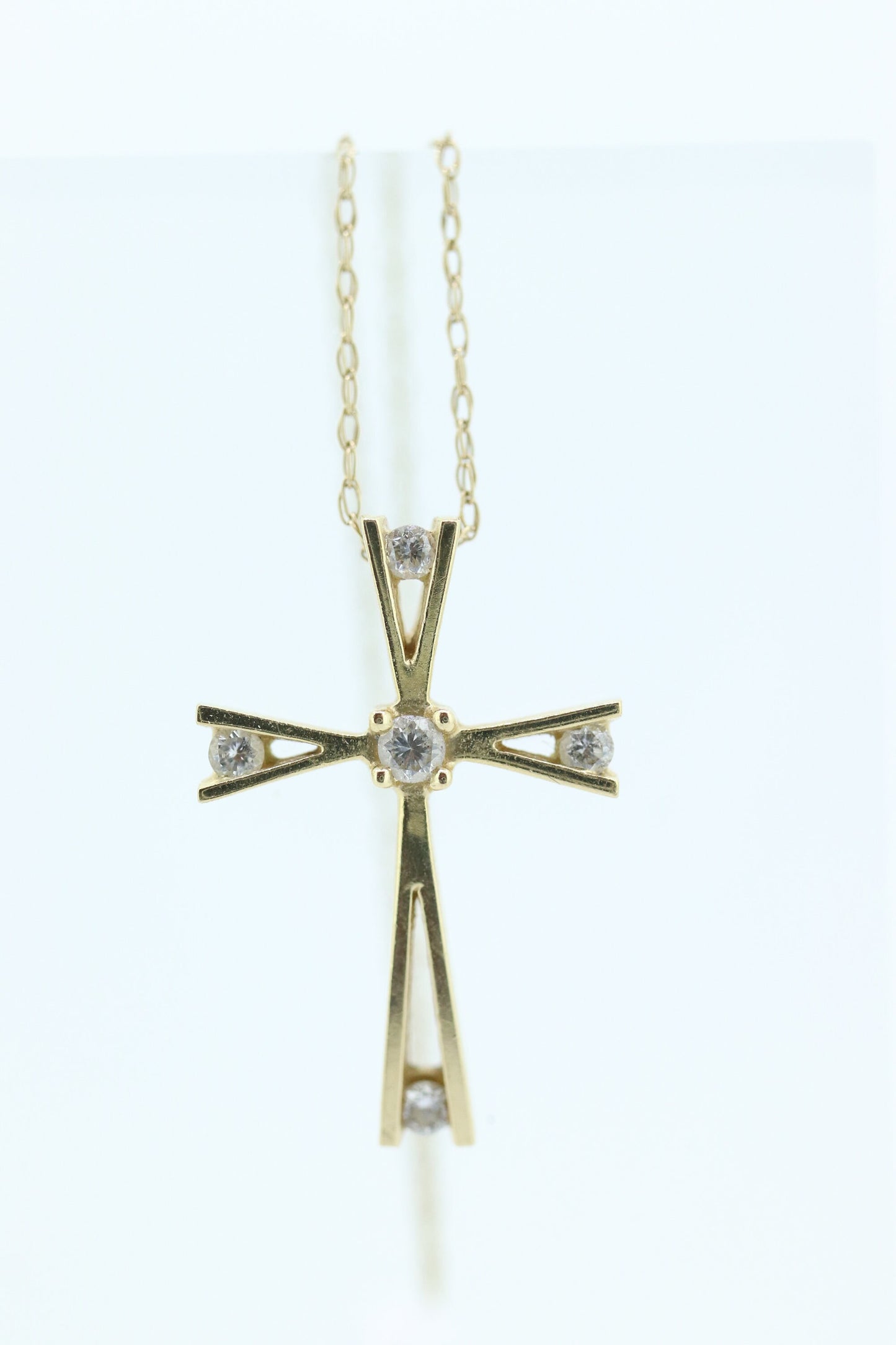 10k cross with diamonds pendant and rope chain necklace. Diamond tension Cross. 10k Yellow Gold.