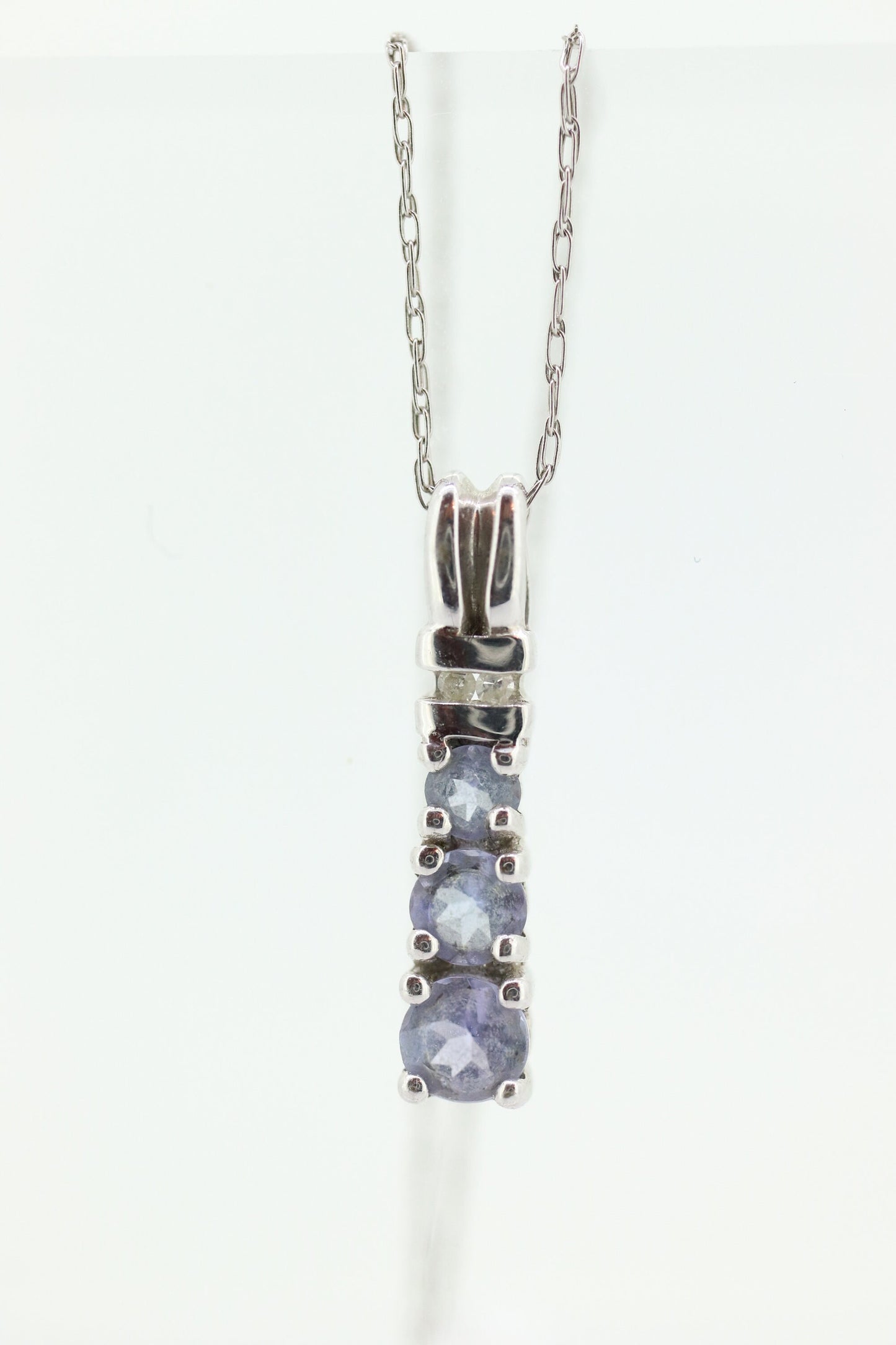 10k Tanzanite and diamond Journey Pendant. Past present future necklace