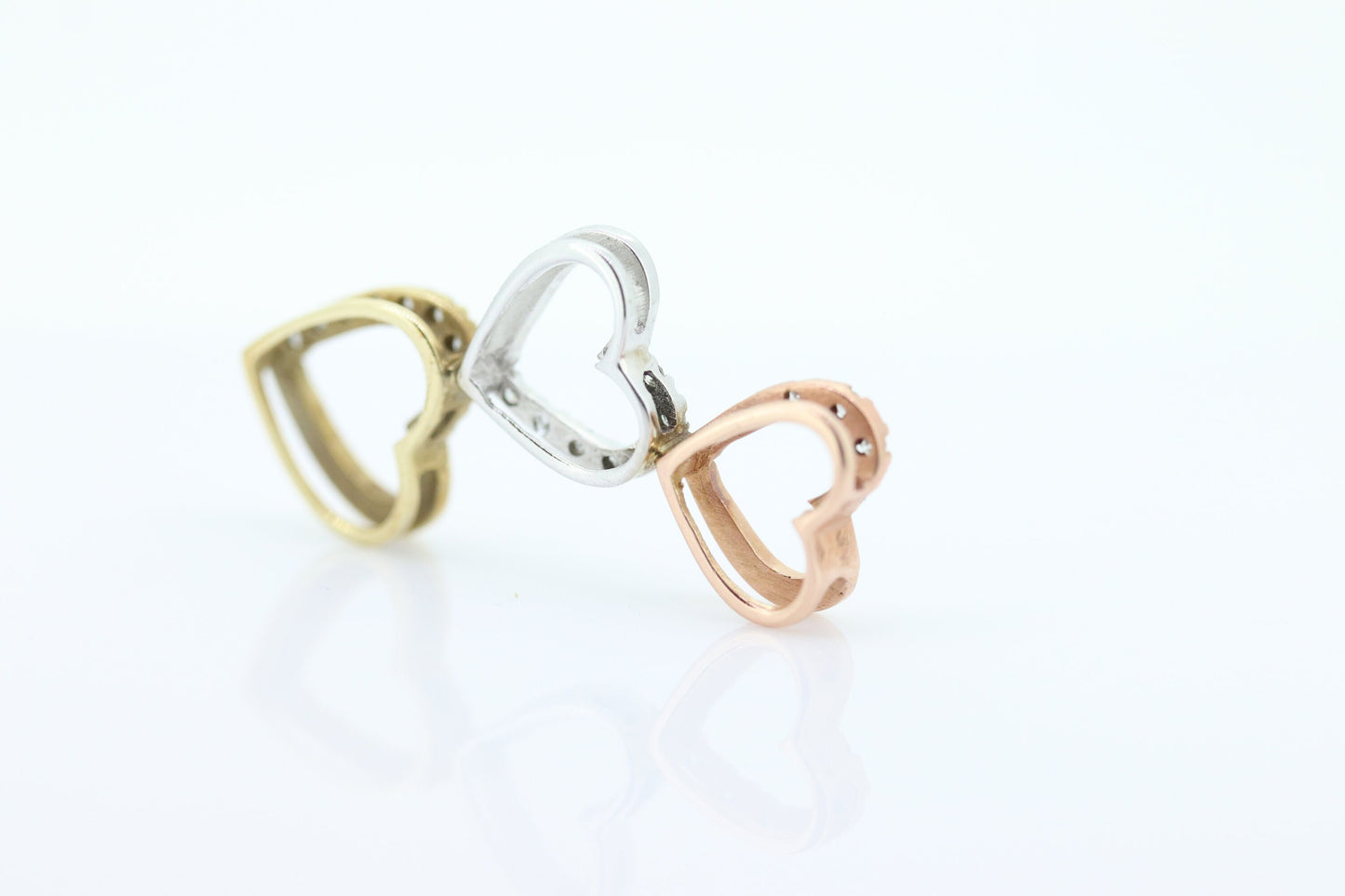 10K tricolor Triple Open Heart Diamond pendant. 10k Rose Yellow White gold.