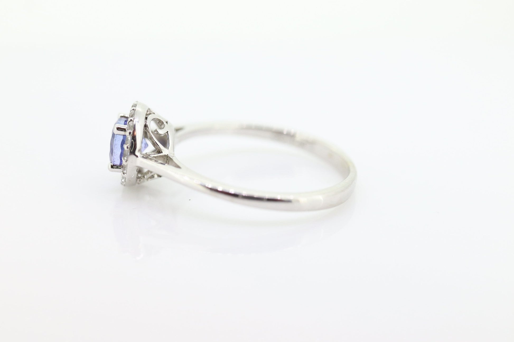 Tanzanite and White topaz (diamond) halo ring. 10k Purple Tanzanite solitaire. st(240)