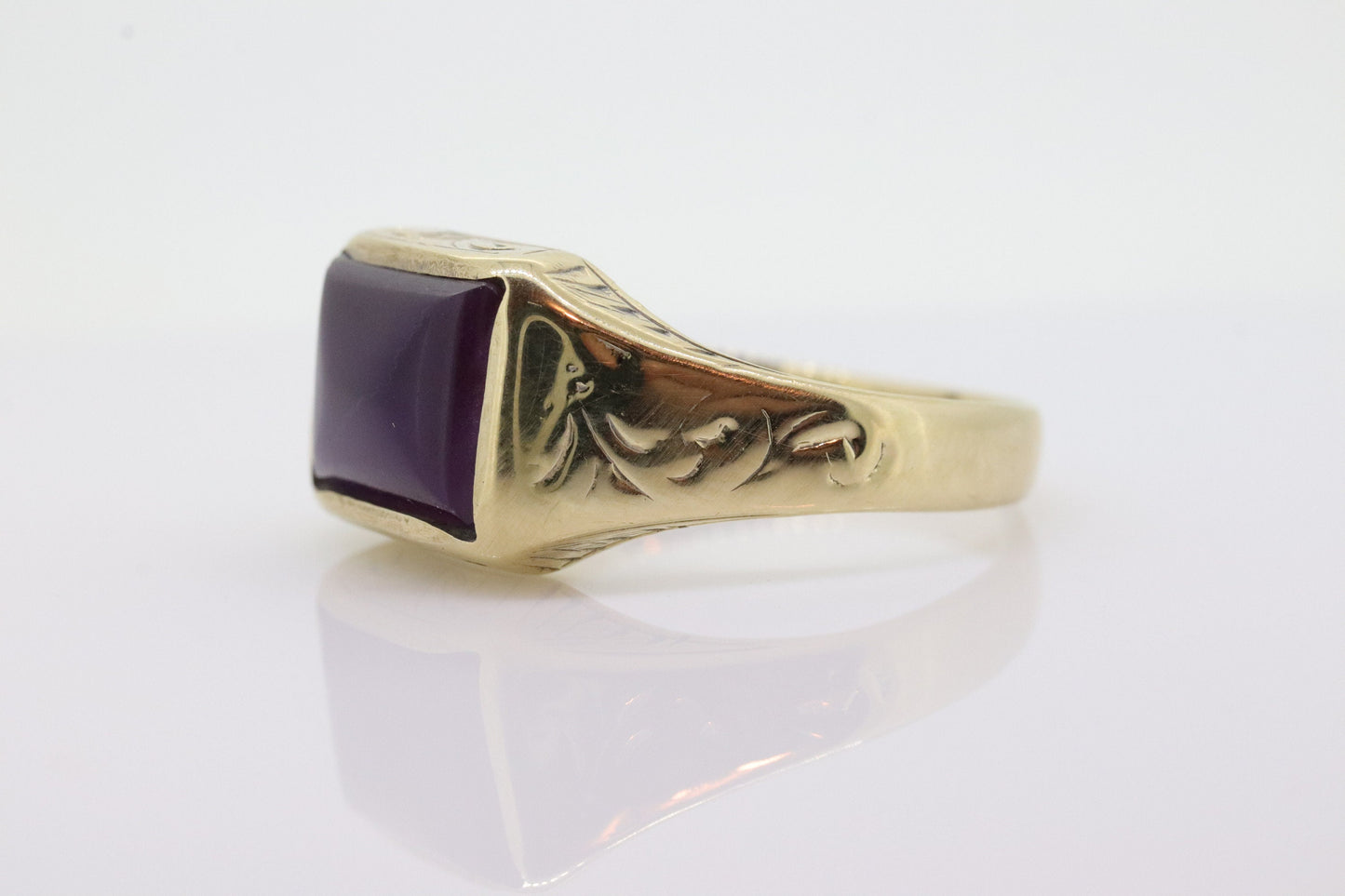 10k SUGILITE Purple bezel ring. Antique engraved 10k Rectangle Purple Sugilite bezel set in a Heavy shank. SZ 11 5.1grams