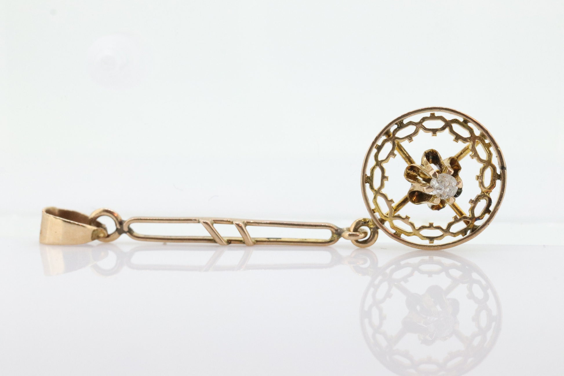 Antique Diamond pendant lavaliere. 10k Gold with a diamond set buttercup. Art nouveau era. st(80)