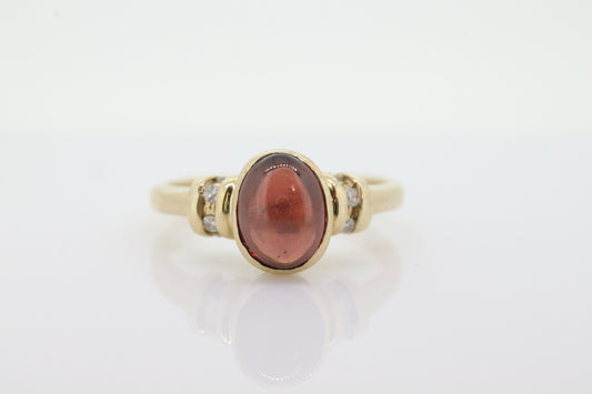 10k Red Tourmaline Ring. Bezel set OVAL Cabochon Tourmaline solitaire and diamond ring. st(92)