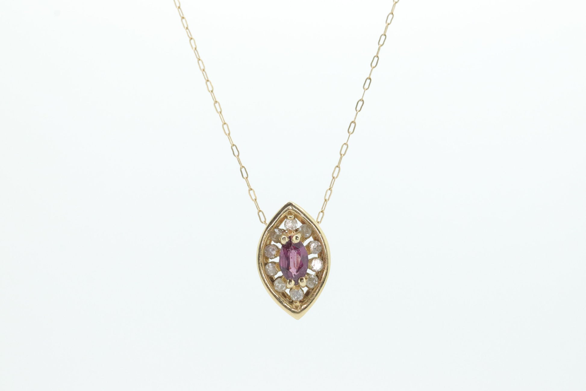 Ruby and diamond halo pendant. 14k precious marquise ruby pendant necklace. st(80/50)